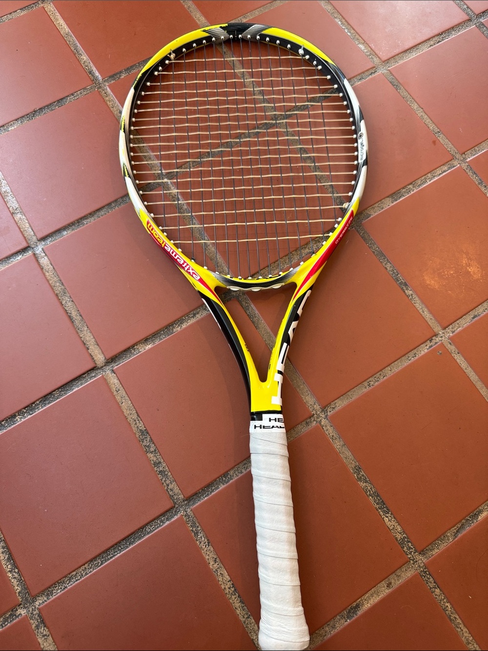 Head Yellow and Black Tennis Racquet with White Grip